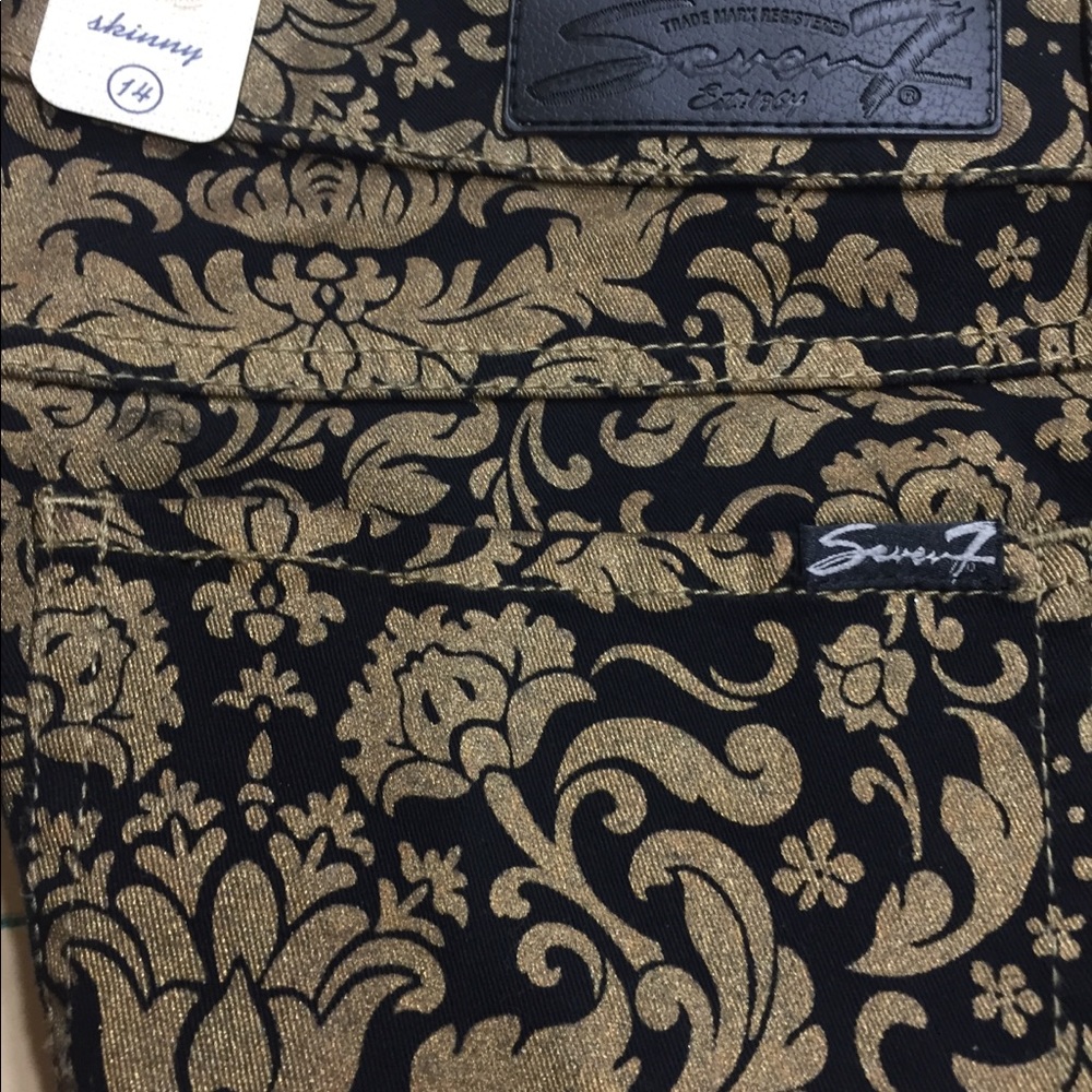 Black Seven7 Luxe jeans with a gold print.